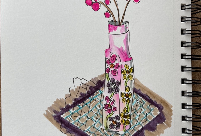 ink sketch of flowered vase on purple and blue doily