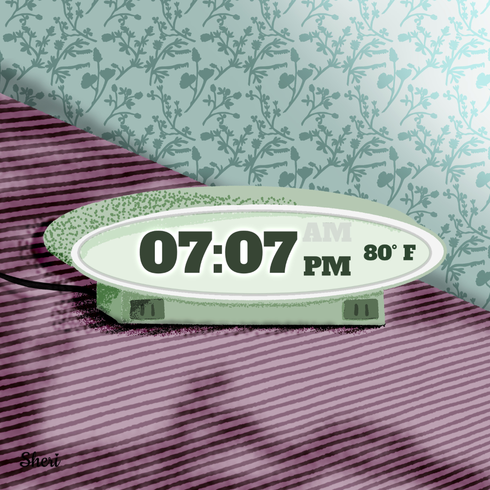 oval green alarm clock on striped purple table against floral wall-papered wall; It's 7:07 PM 80°F